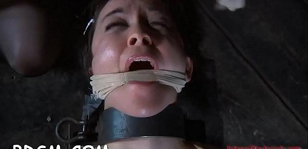  Clamped up hottie gets a hook in her anal with toy torture
